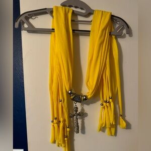 Yellow Scarf with Silver Cross Pendant